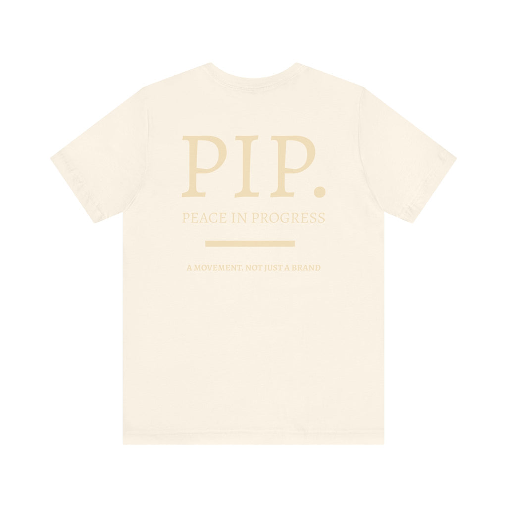 Peace In Progress Tee — PIP. Crew Neck Short Sleeve T‑Shirt
